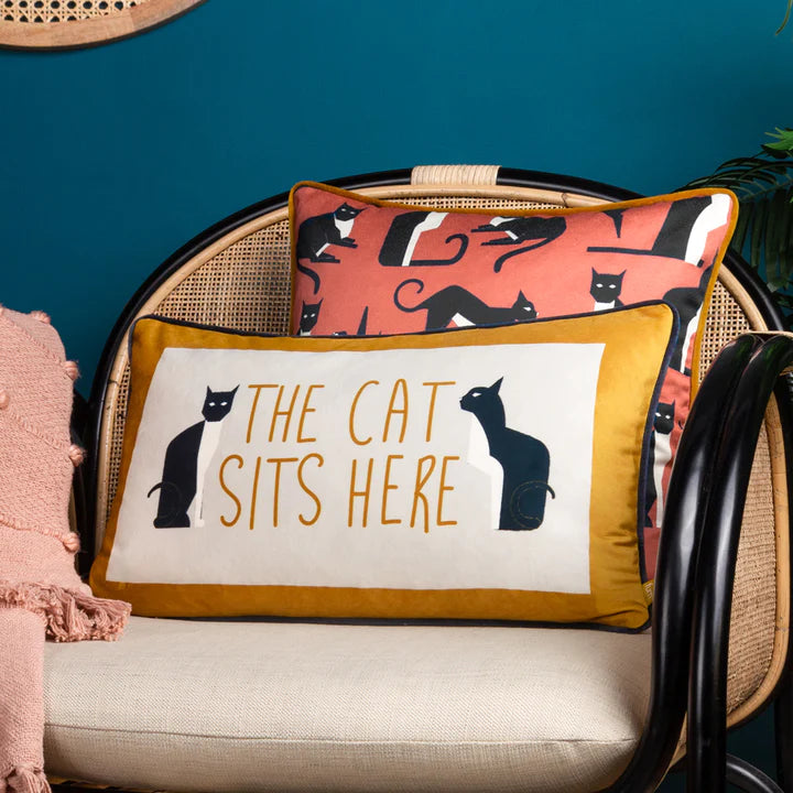 'The Cat Sits Here' Ochre Cushion