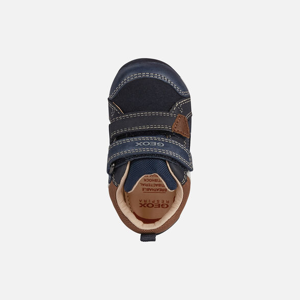 Navy And Light Brown Boy's breathable comfortable first-steps sneaker with an easy-to-match design.