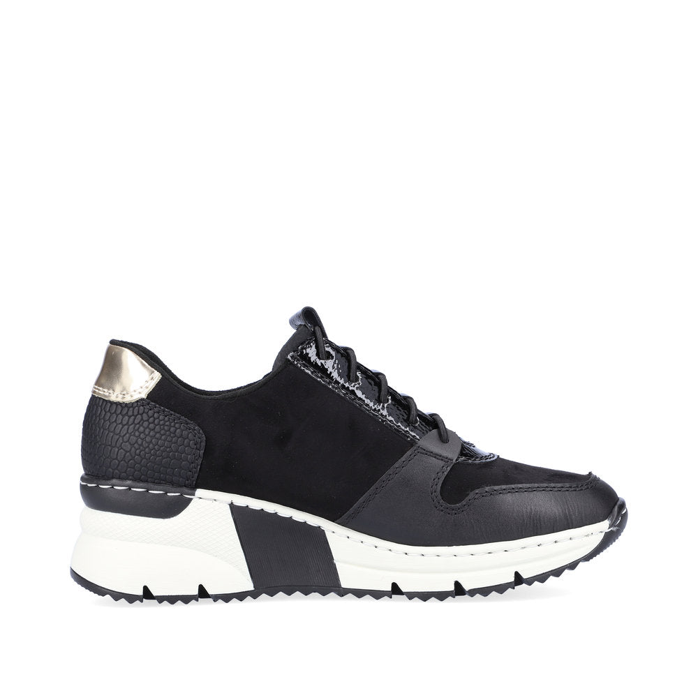 Side View of Rieker Black Trainer with Reflective Details