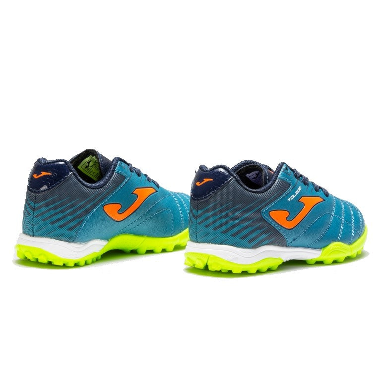 Blue laced astro turf runners from Joma with bright and sporty green and orange accents.
