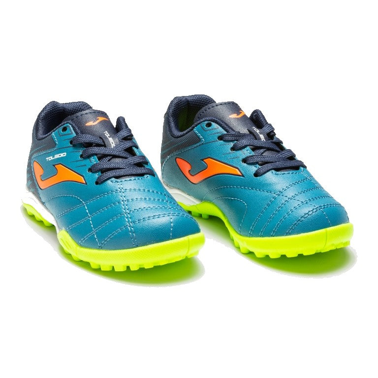 Blue laced astro turf runners from Joma with bright and sporty green and orange accents.