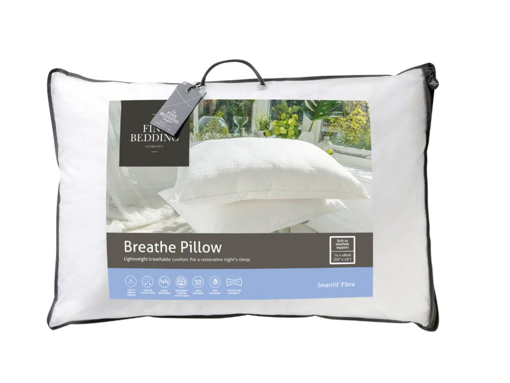 Bag with handle containing a white pillow. Picture on bag displaying two white pillows in a bright room. Reads The Fine Bedding Company, Breathe Pillow, Lightweight breathable comfort for a restorative nights sleep