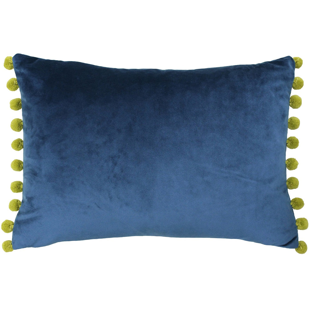 Rectangular cushion in a beautiful teal blue colour with a golden olive colour pom pom trim on the short sides